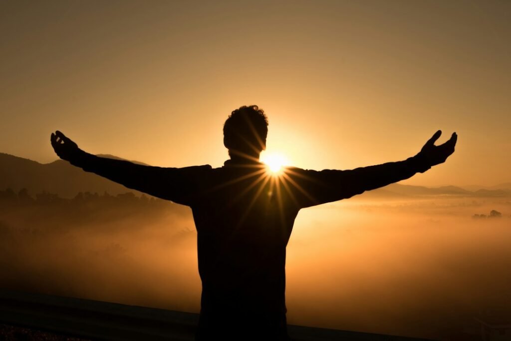 Silhouette at sunrise, representing Surya (Sun) remedies