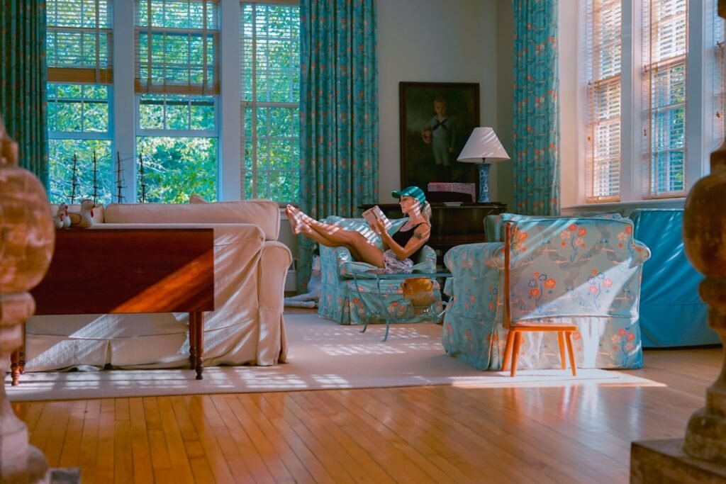 Woman relaxing peacefully in a bright reading corner in daylight