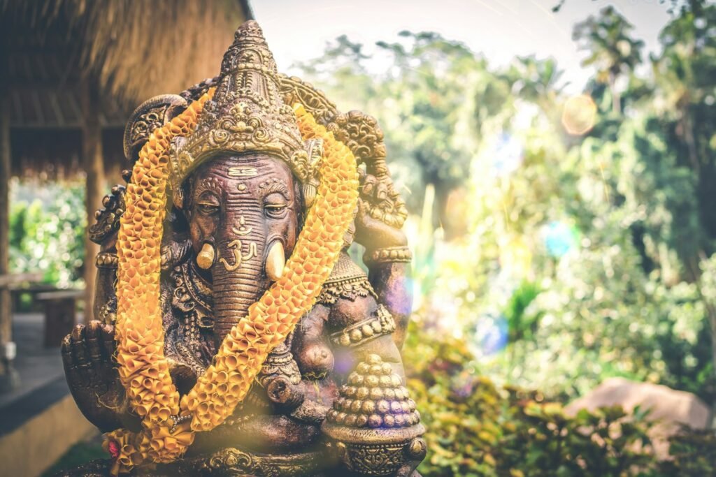 Close up bronze Hindu deity statue used in temple puja