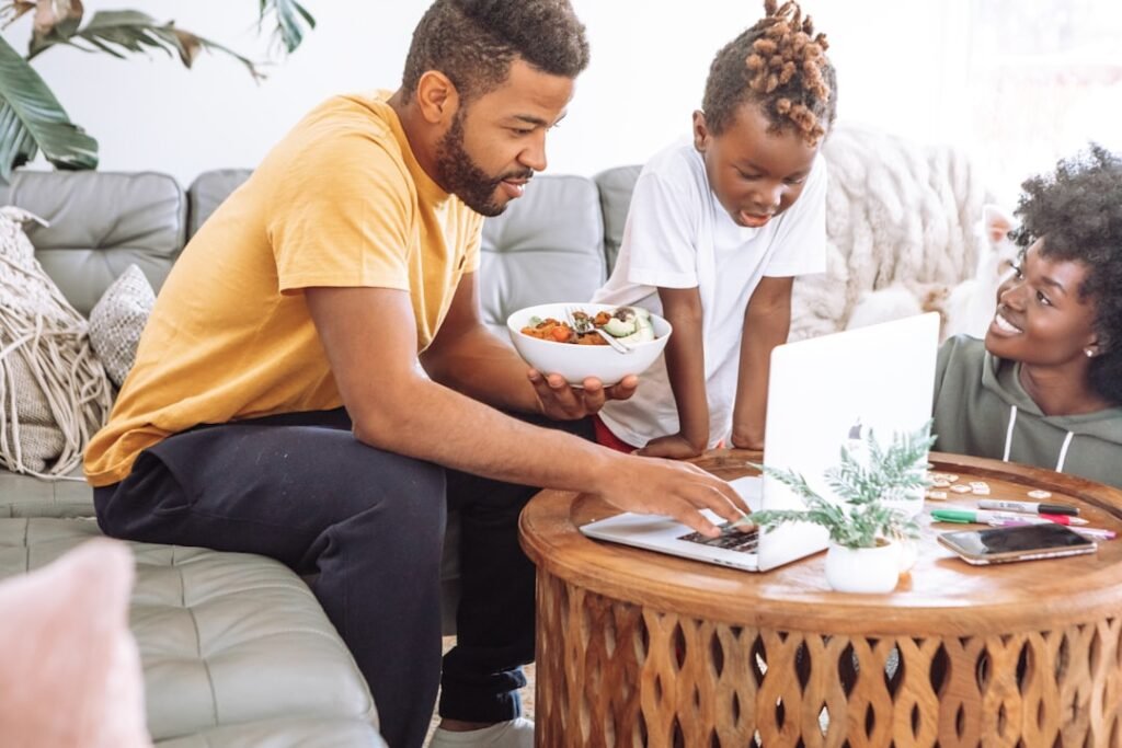 Couple relaxed together on a sofa at home in daylight