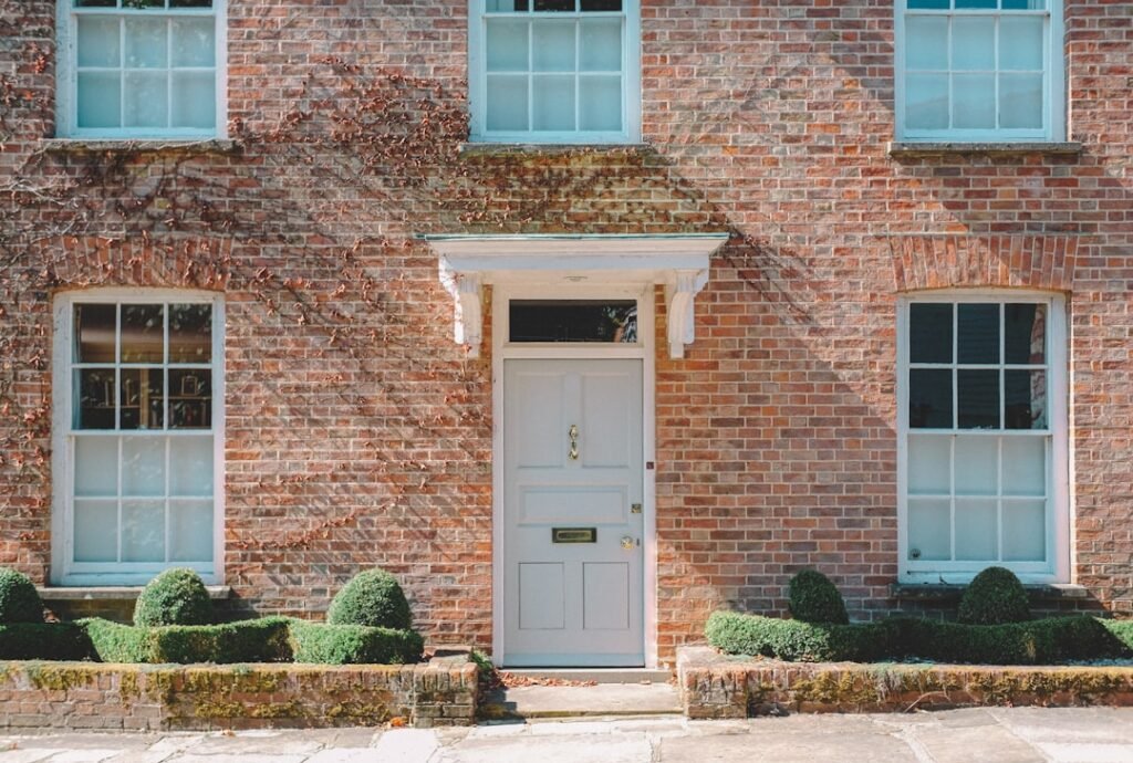 Brick house with a white wooden front door