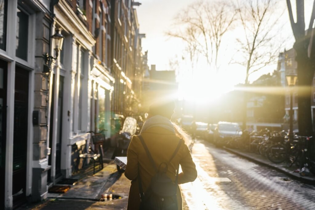 Confident person walking forward in daylight