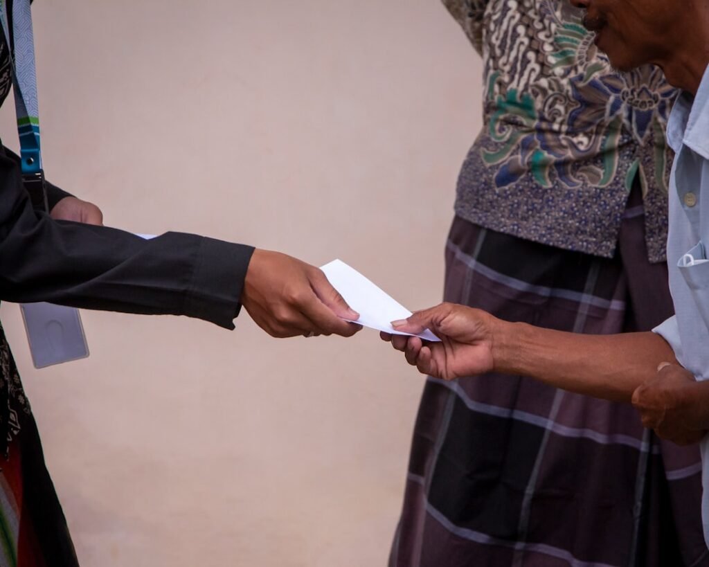 Person receiving recognition for public achievement in daylight