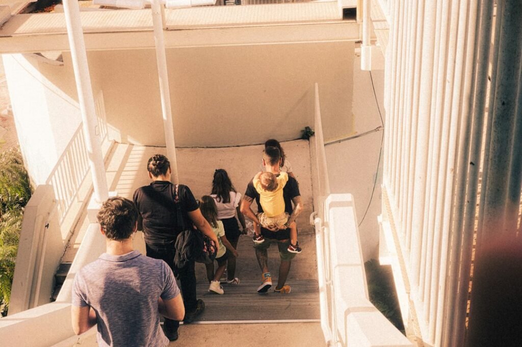 group walking up stairs daylight