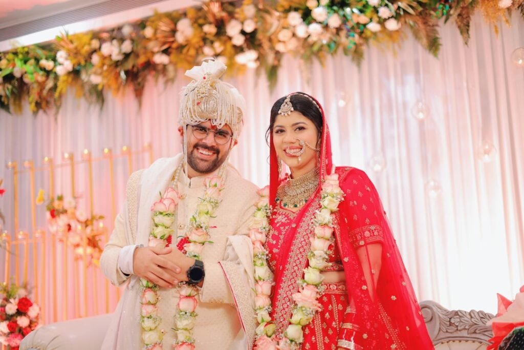 Newlyweds posing together at their wedding in daylight