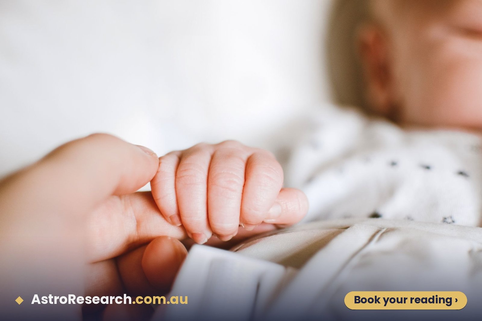 Newborn baby's hand gently gripping a parent's finger, the moment of birth that a Vedic birth chart is calculated from