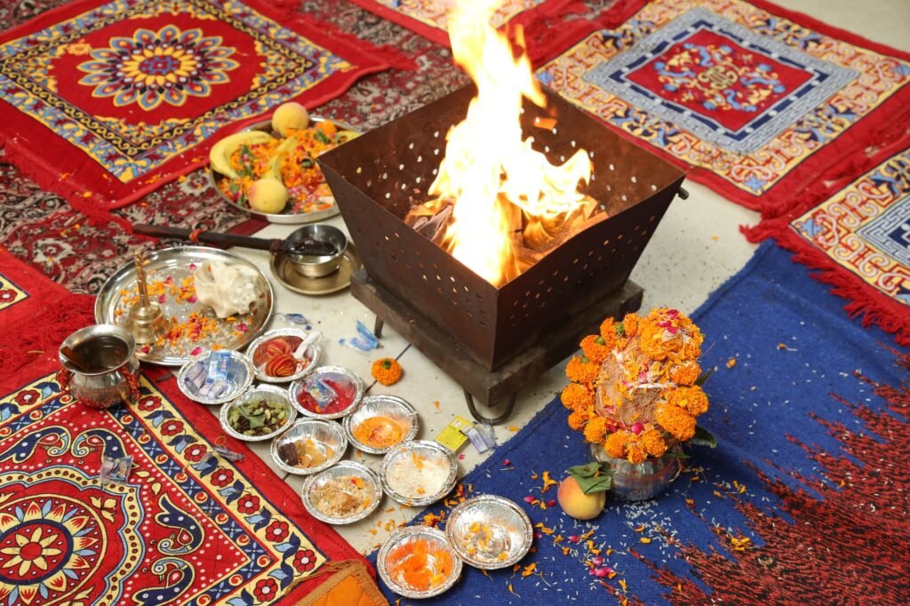 Havan fire ritual set up with colourful offerings for a Navagraha puja